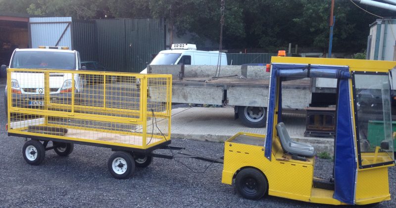 Yellow Electric Vehicle Tug and trailer